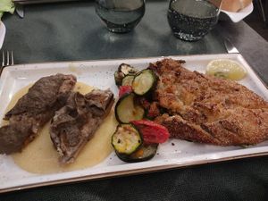 Eggplant cotoletta, zucchini, Portobello mushrooms with polenta at Pan GhEA in Milan