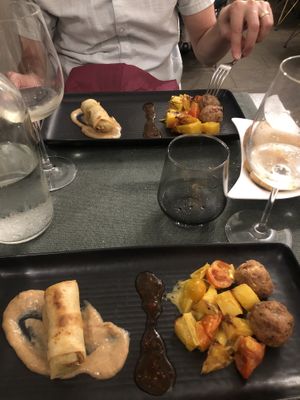 Potato filled egg roll and meatballs with potatoes, separated by sweet chili sauce. Combo did not work    at Pan GhEA in Milan