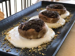 Stuffed mushrooms with almond and a rice based cream  at Pan GhEA in Milan
