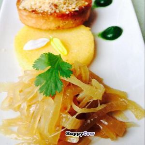 Tofu with polenta and onions at Pan GhEA in Milan