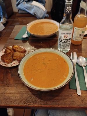 Cabbage soup with curry and coconut milk, side of baked potatoes  at little green kitchen - Kunibertsviertel in Cologne