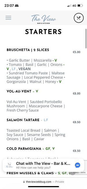Screenshot of vegan bruschetta from menu  at The View Bar & Kitchen in Zebbug