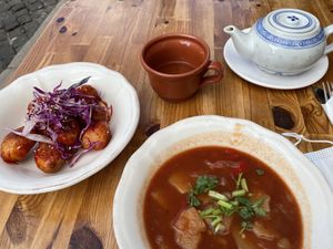Traditional Portuguese potato and stew dishes at Princesa do Castelo in Lisbon