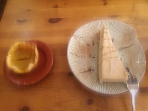 Cheesecake and custard tart (amazing) at Princesa do Castelo in Lisbon