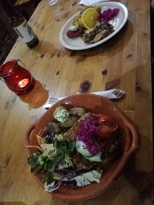 Bean burger with salad and lentil, potato plate at Princesa do Castelo in Lisbon