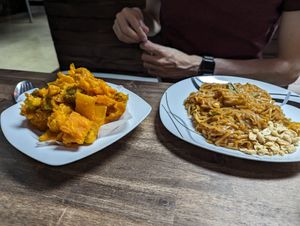Vegetable tempura and pad thai noodles at Thai Curry in Houston