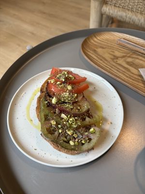 Toast special - tomato & pistachioo  at Selva Coffee in Sevilla