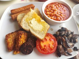 Vegan breakfast - sausages, hash browns, tomato, mushroom, beans, toast at A'bout Thyme in Glossop