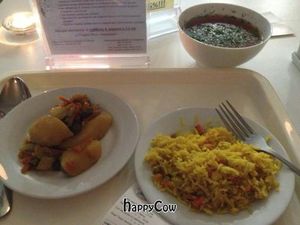 Basmati rice with saffron, potatoes & green beans, and the BEST vegetable soup I've ever had in my life. at Ayurveda Cafe in Kyiv