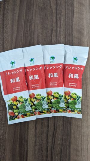 Dressing bought from Family Mart 🛒 next door (28¥) at ALLY's 58Street Coffee in Naha