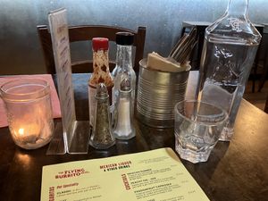 Unique bottle used for the tap water brought to the table   at The Flying Burrito Brothers  in Auckland