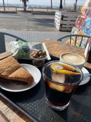 Vegan pastry, vermouth, coffee with oat milk, crisps  at Forn Sant Salvador in Tarragona