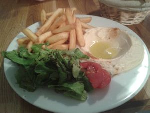 Hummus with salad and fries at Al-saj in Rennes