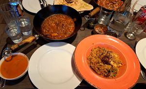 Overview of all the dishes including vegan garlic naan  at Ashoka - Ashton Lane in Glasgow