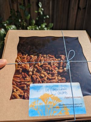 Sticky buns in cute packaging  at The Compassionate Crumb in Mountain View