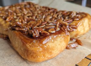 Sticky Buns! Fluffy cinnamon rolls covered in pecans and homemade caramel. at The Compassionate Crumb in Mountain View