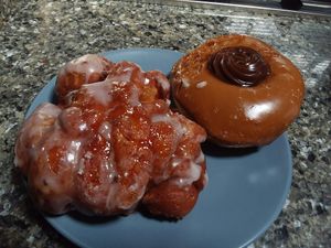 Apple fritter and salted caramel chocolate donut! at Just Fine Donuts in Alexandria
