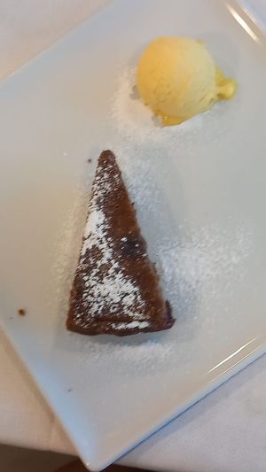 Torta di grano saraceno con mirtilli e gelato alla crema at Da Franco in Seriate