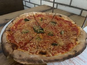 Their vegan pizza, $20 as of August 2025  at Pizzeria La Rosa in New Rochelle