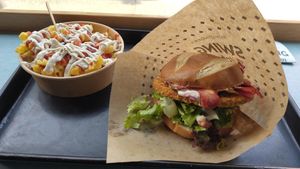 Bavarian burger with classic fries at Swing Kitchen - Invalidenstraße  in Vienna