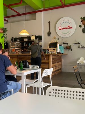 Indoor seating at Semilla by ConGreka  in San Juan