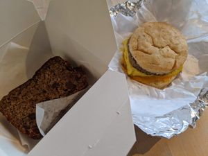Chocolate Chip Banana Bread; Sausage, Egg & Cheese Breakfast Sandwich at Petunia's Pies and Pastries in Portland