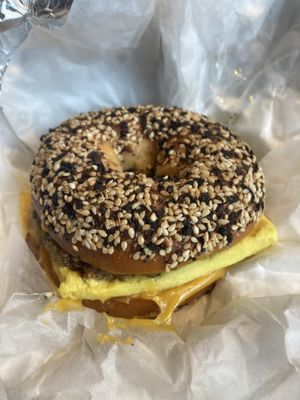 Breakfast bagel sandwich with tofu egg and vegan cheese and sausage  at Petunia's Pies and Pastries in Portland