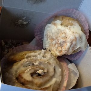 Delicious cinnamon rolls to go from Petunias booth at Portland Farmers Market at Petunia's Pies and Pastries in Portland