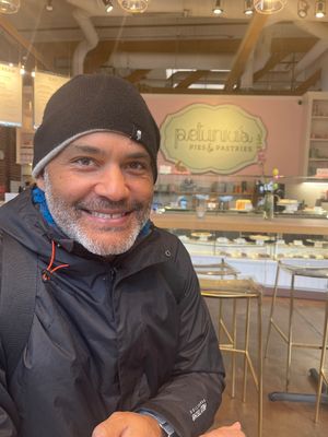 Happy man  at Petunia's Pies and Pastries in Portland