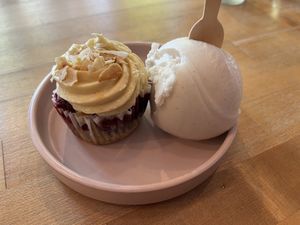 a cupcake and a scoop of ice cream  at Petunia's Pies and Pastries in Portland