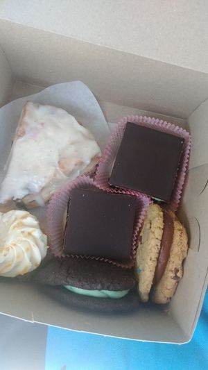 Mint brownies, bluberry lemon scone, babycake, and cookie sandwhiches at Petunia's Pies and Pastries in Portland