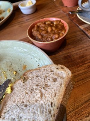 Bread and beans that come with full vegan   at The Veg Box Cafe - London in North West London