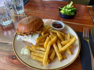 Burger Royale and a side of steamed broccoli at The Veg Box Cafe - London in North West London