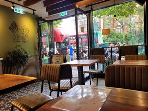 Indoor seating downstairs at The Veg Box Cafe - London in North West London