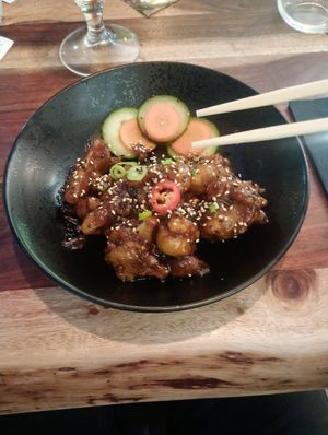 Mongolian cauliflower bites, good portion (chopsticks close to camera!) at The Veg Box Cafe - London in North West London