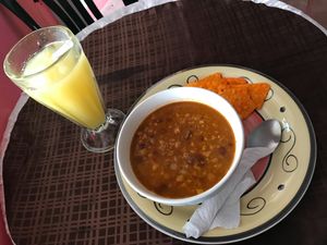 Vegan lentil soup and orange juice at Cafe Kitsch in Panajachel