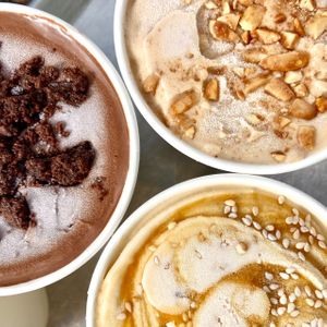 Grasshopper, Tahini Caramel, and Candied Almond pints. at Crème de la Crop in Herndon