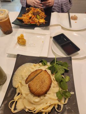 Chicken fettuccine alfredo and ramen noodles (ft. one rangoon left) at VeGreen Noodle   in Buford