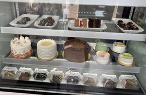 Case of cakes, cake slices and doughnuts   at Yvonne's Vegan Kitchen in Pasadena