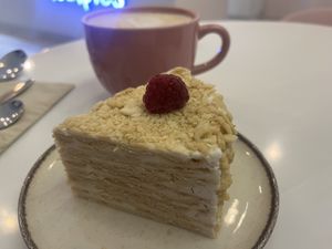 Neapolitan cake with hazelnut milk latte   at Healpies Almaty  in Almaty
