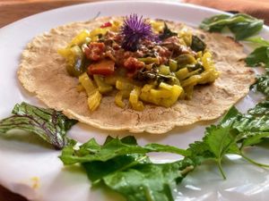 Selfmade Naanbrot with herbs from the garden at Pinakarri in Luzern