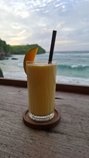 Mango smoothie - veganized with coconut cream at Jimmy Beach Cafe in Tabanan