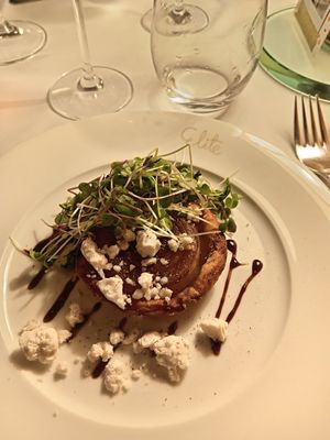 Onion tart with vegan cheese at Elite in Helsinki
