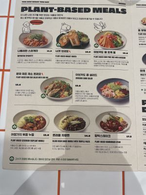 Most of menu are vegan basically, but a few menu contains non-vegan ingredients. The green mark on the left side on the dish photo means to have cilantro in it.  at You Are What You Eat in Seoul