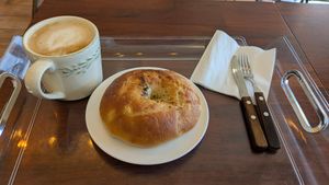 Onion bagel and latte at Veganature - 비건네이처 in Seoul