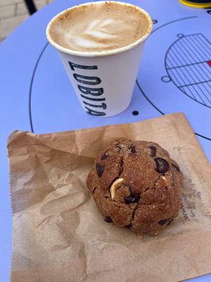 Oat milk cappuccino & vegan breakfast cookie   at Lobita in Biarritz