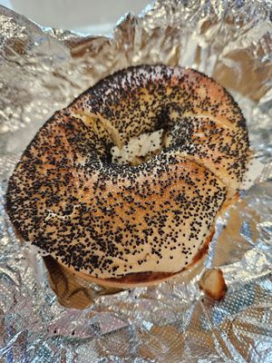 Poppy seed bagel with vegan cream cheese at Bagels on the Square in New York City