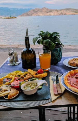 Vegan plate - grilled vegetables, polenta, chimichurri sauce and garlic bread. This tasted truly amazing, customer service is really nice - even when busy! Beautiful!🌊 at Poper in Baska