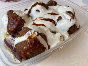 Another terrible photo but there is some salad under the mountain of falafel and tahini.  at Lazeez Falafel Salad Bar in Durham