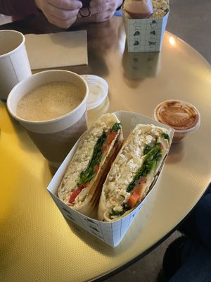‘Baby loves tacos’ vegan breakfast burrito and Oatmilk latte. Delicious    at Vibrant Sunshine in Aspinwall